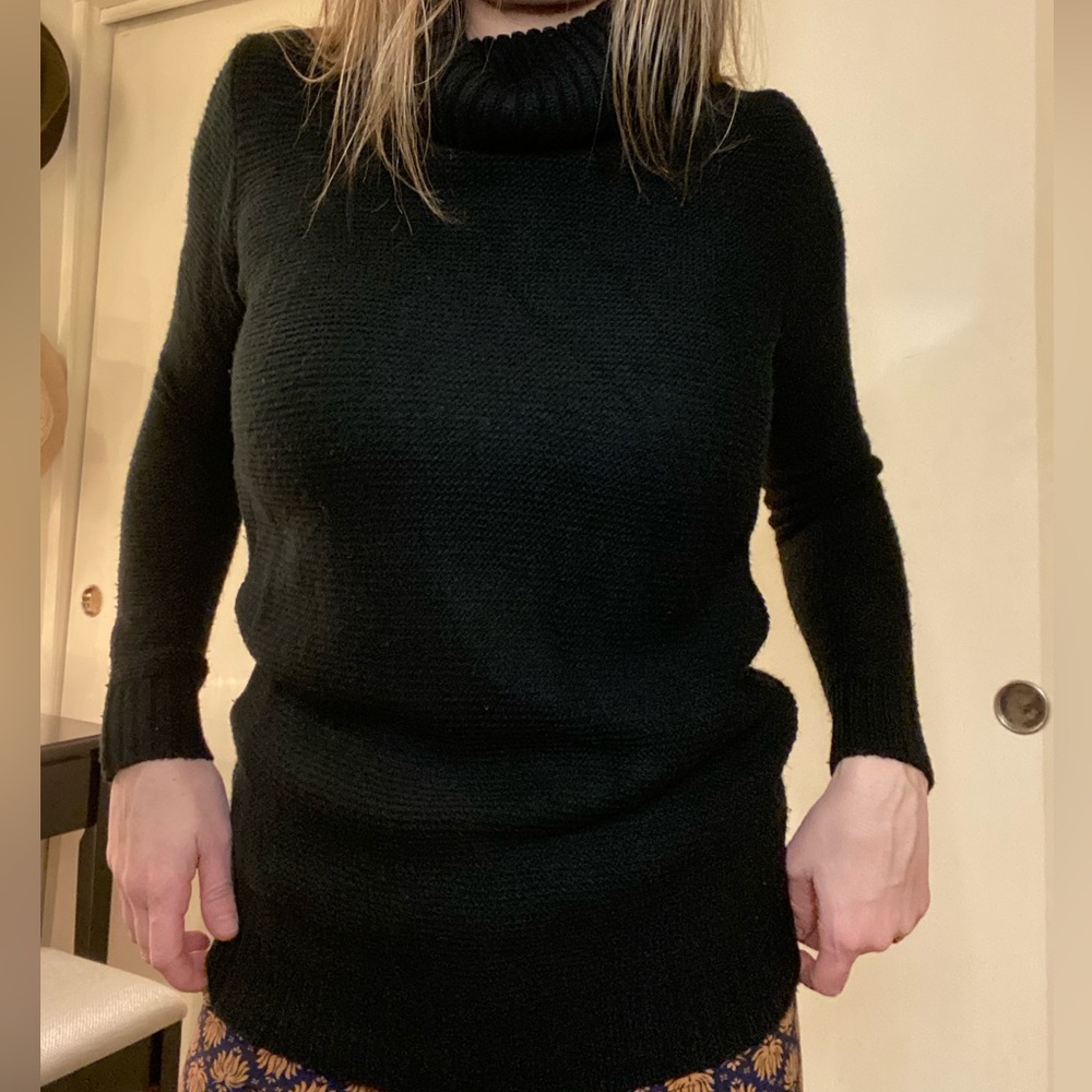 Black cable knit turtleneck sweater